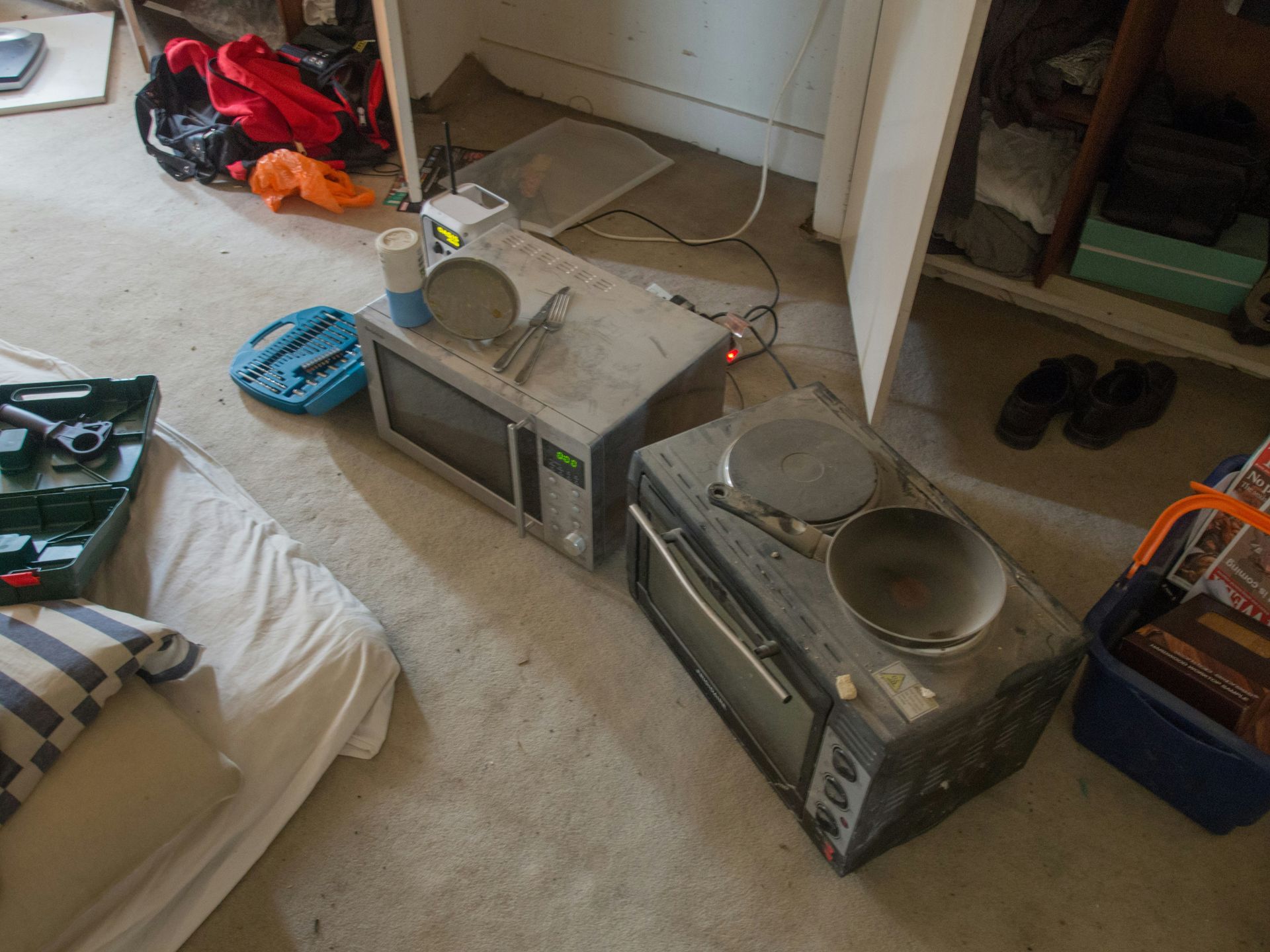 gray cassette player on white floor